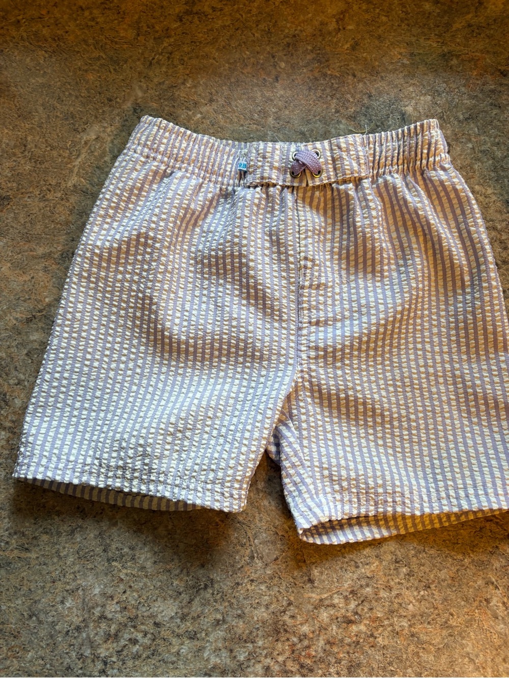 Ruffle Butts Light Purple & White Seersucker Swim Trunks
